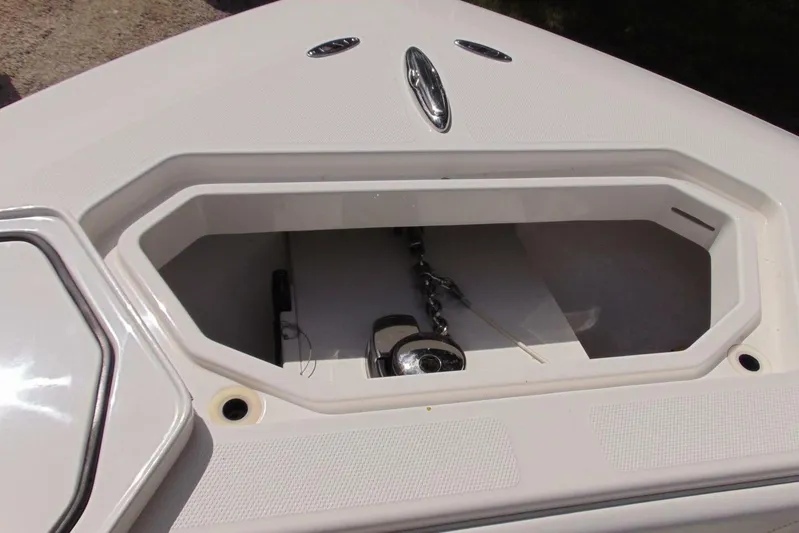 Incognito Yacht Photos Pics Anchor storage compartment on 2020 Invincible 36 Open boat, featuring a chain and cleat.