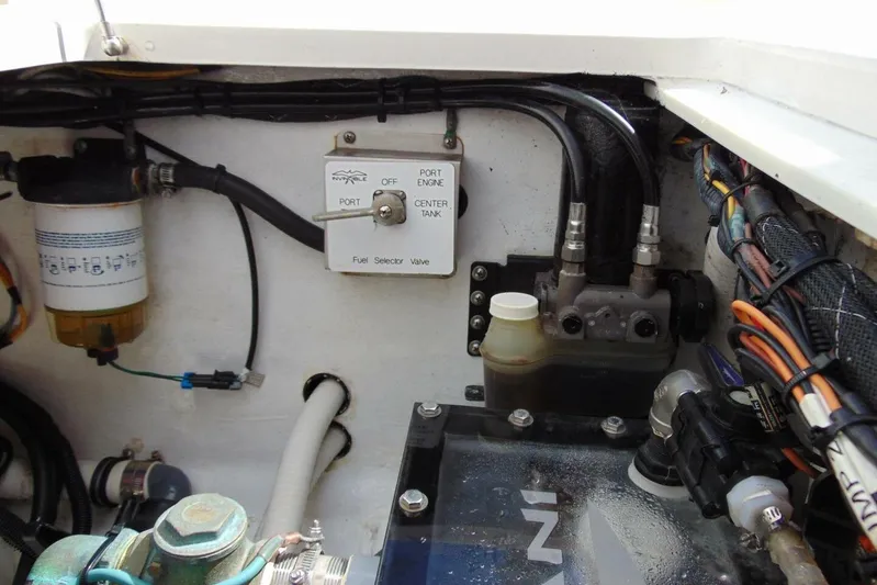 Incognito Yacht Photos Pics Engine compartment of 2020 Invincible 36 Open boat with fuel selector valve and wiring.