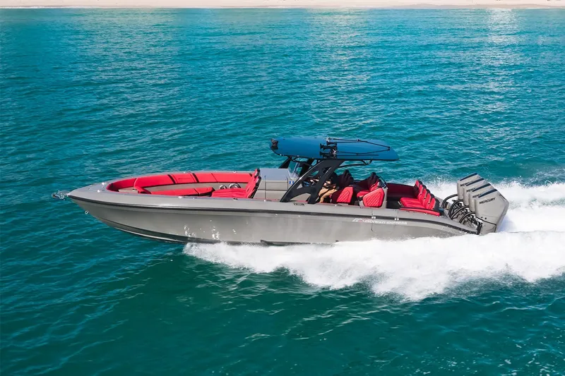  Yacht Photos Pics 2023 Midnight Express 37' Open boat cruising on blue ocean waters.