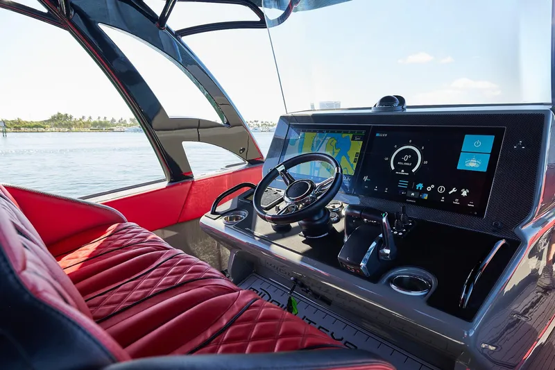  Yacht Photos Pics Luxurious helm of 2023 Midnight Express 37' Open boat with advanced navigation system.