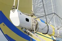 Sailing yacht Devonport Challenge 67, 1995 model, with vibrant yellow and blue sails.