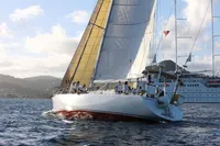 Sailing yacht Devonport Challenge 67, 1995 model, navigating ocean waters with crew onboard.