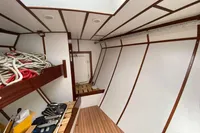Interior of 1995 Devonport Challenge 67 yacht with ropes and wooden accents.