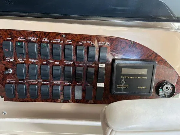  Yacht Photos Pics Control panel of a 2001 Sea Ray 460 Sundancer yacht with various switches and systems monitor.