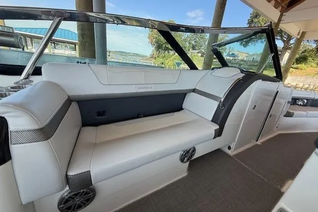  Yacht Photos Pics 2018 Formula 350 Crossover Bowrider OB interior with white seating and scenic marina view.