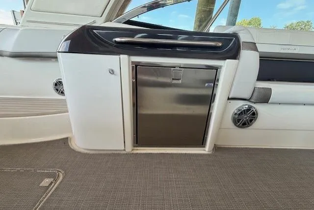  Yacht Photos Pics 2018 Formula 350 Crossover Bowrider OB interior with stainless steel fridge and seating.