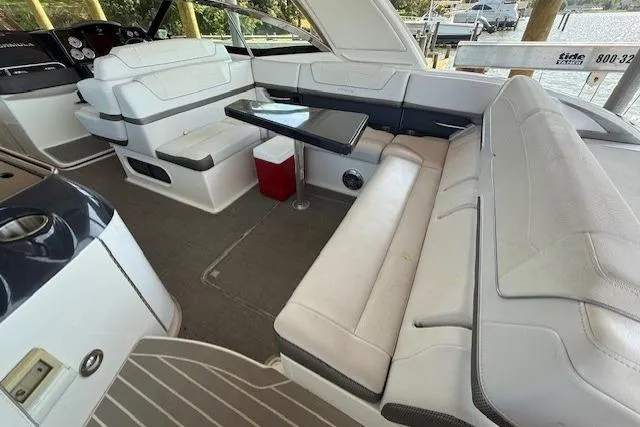  Yacht Photos Pics 2018 Formula 350 Crossover Bowrider OB interior with spacious seating and table.