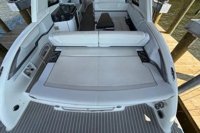  Yacht Photos Pics 2018 Formula 350 Crossover Bowrider OB, spacious seating, luxurious interior, docked by water.