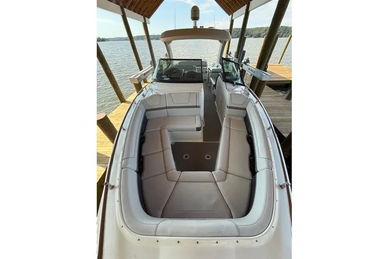  Yacht Photos Pics 2018 Formula 350 Crossover Bowrider OB, spacious seating, docked by the water.