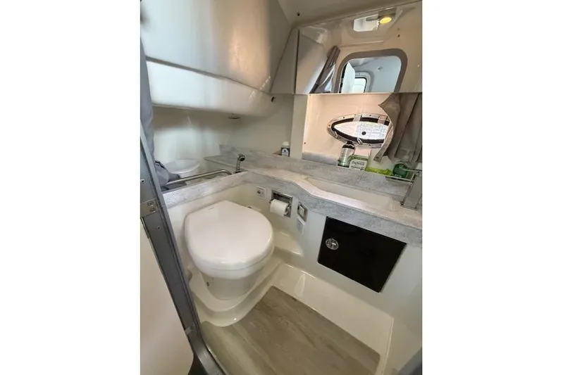  Yacht Photos Pics 2018 Formula 350 Crossover Bowrider OB bathroom with modern amenities and sleek design.