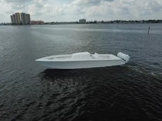  Yacht Photos Pics Sparks 46 boat cruising on open water, 2025 model.