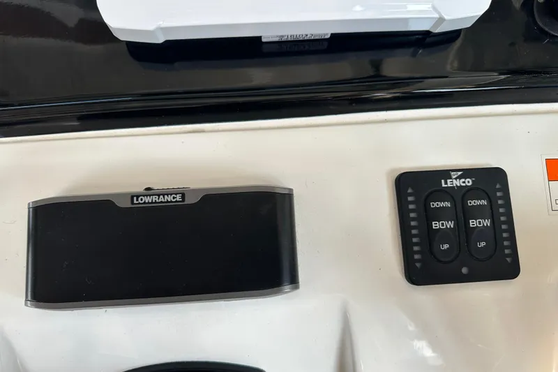 Makai Yacht Photos Pics Control panel of 2016 Jeanneau Merry Fisher 855 with Lowrance and Lenco systems.