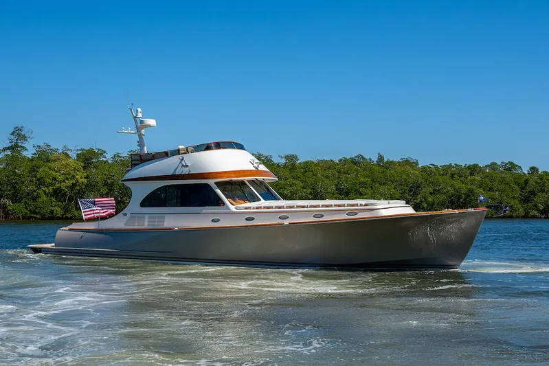 Vera North Yacht Photos Pics 2021 Hinckley Talaria 55 Flybridge MKII yacht cruising on a sunny day.