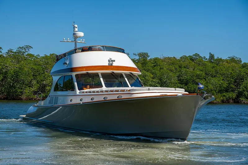 Vera North Yacht Photos Pics 2021 Hinckley Talaria 55 Flybridge MKII yacht cruising on a sunny day.