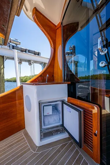 Vera North Yacht Photos Pics Hinckley Talaria 55 Flybridge MKII 2021 yacht with open mini fridge on deck.