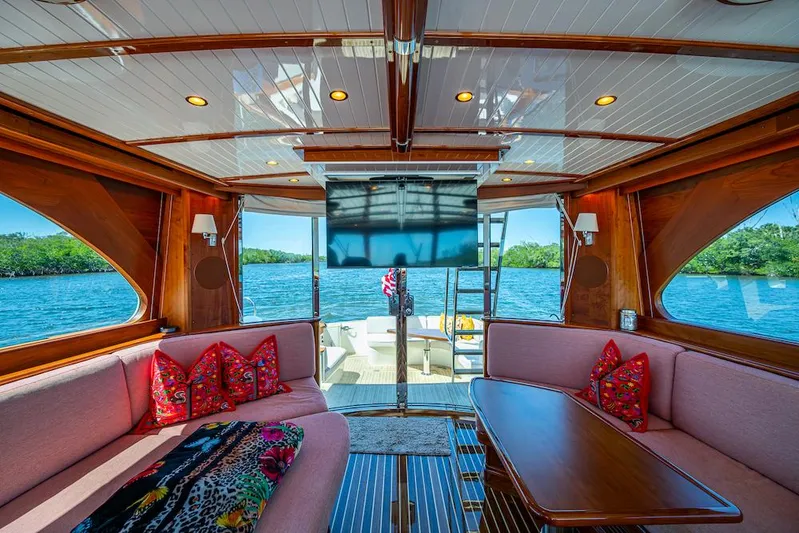 Vera North Yacht Photos Pics Luxurious interior of 2021 Hinckley Talaria 55 Flybridge MKII yacht with scenic water view.