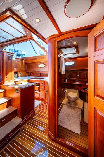 Vera North Yacht Photos Pics Luxurious interior of 2021 Hinckley Talaria 55 Flybridge MKII yacht with wooden finishes.