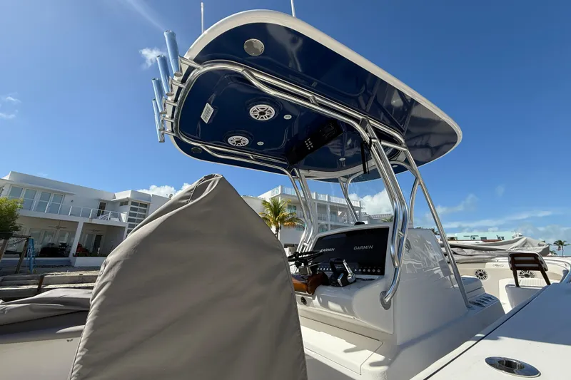  Yacht Photos Pics 2024 Valhalla Boatworks V-29 Hybrid with advanced navigation, docked under clear blue sky.