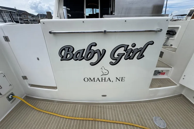 Baby Girl Yacht Photos Pics 1999 McKinna 57 Pilothouse yacht named "Baby Girl" docked in Omaha, NE.