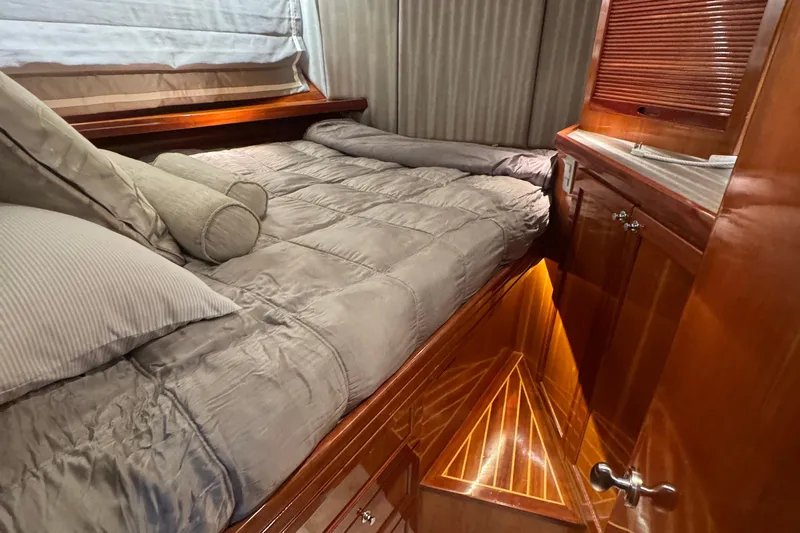 Baby Girl Yacht Photos Pics Luxurious cabin interior of 1999 McKinna 57 Pilothouse yacht with cozy bedding.