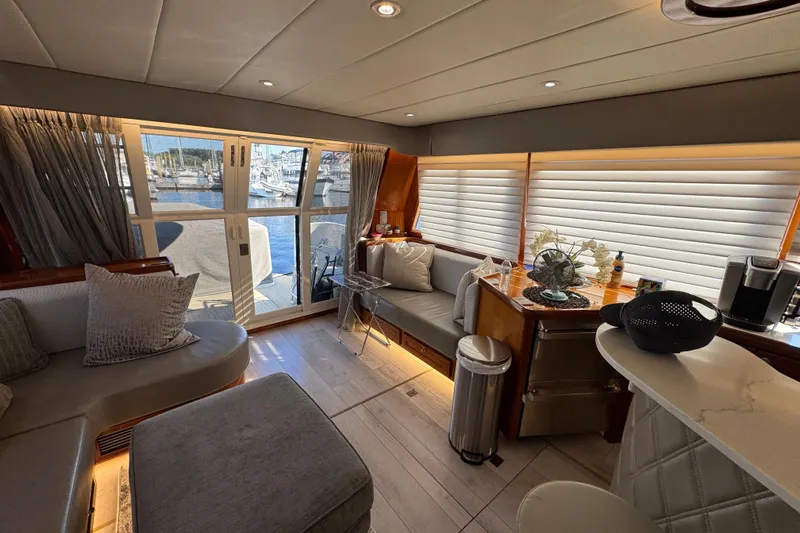 Baby Girl Yacht Photos Pics Luxurious interior of 1999 McKinna 57 Pilothouse yacht with elegant seating and decor.