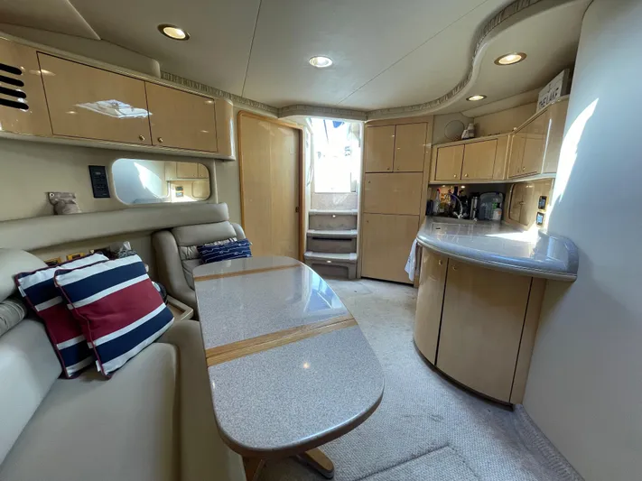 Limin Yacht Photos Pics Luxurious interior of 2000 Sea Ray 460 Sundancer yacht with modern furnishings.