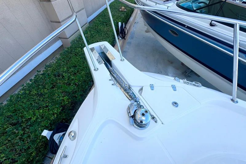 Turn Key Yacht Photos Pics 2006 Boston Whaler 285 Conquest boat deck with anchor and railing.