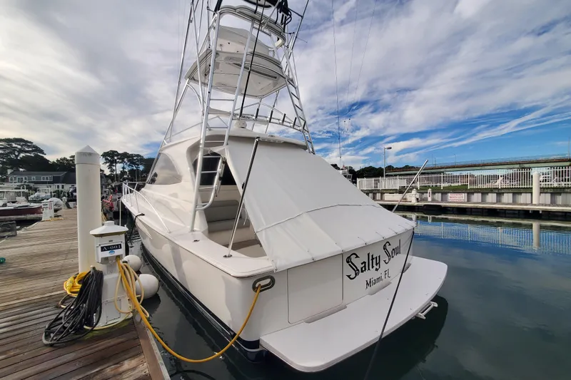 Salty Soul Yacht Photos Pics 2023 Viking 48 Sport Tower yacht docked, named "Salty Soul," Miami, FL.