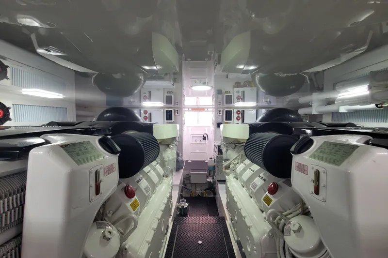 Salty Soul Yacht Photos Pics Engine room of 2023 Viking 48 Sport Tower yacht, featuring advanced machinery and equipment.