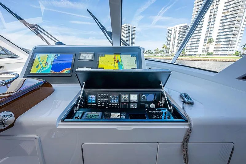 Salty Soul Yacht Photos Pics 2023 Viking 48 Sport Tower helm with advanced navigation displays and controls.