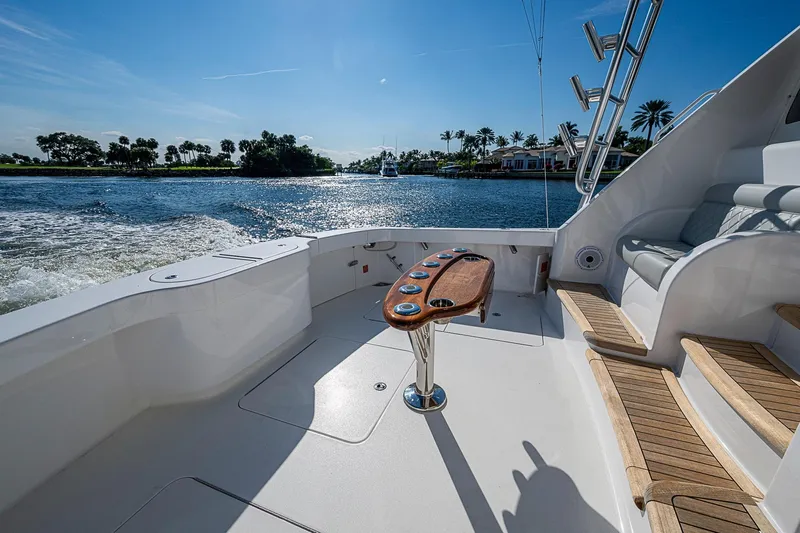 Salty Soul Yacht Photos Pics 2023 Viking 48 Sport Tower yacht deck with scenic water view.