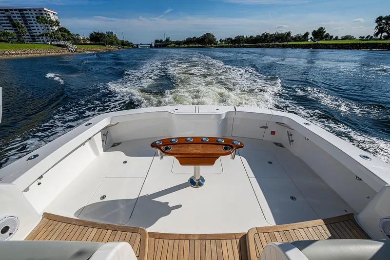 Salty Soul Yacht Photos Pics 2023 Viking 48 Sport Tower yacht cruising on a sunny day.