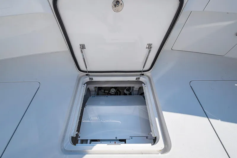 Salty Soul Yacht Photos Pics Open hatch on 2023 Viking 48 Sport Tower yacht deck.