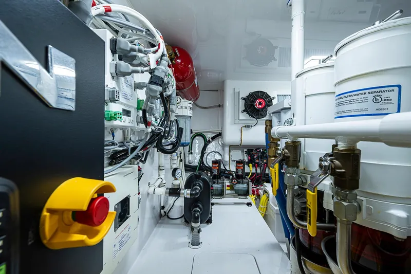 Salty Soul Yacht Photos Pics Engine room of 2023 Viking 48 Sport Tower, showcasing advanced mechanical systems and components.