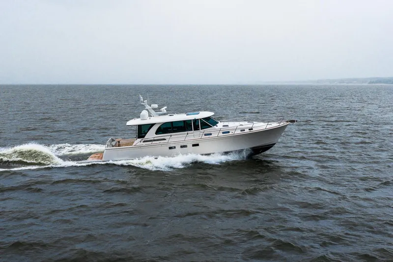  Yacht Photos Pics 2024 Sabre 58 Salon Express cruising on open water.