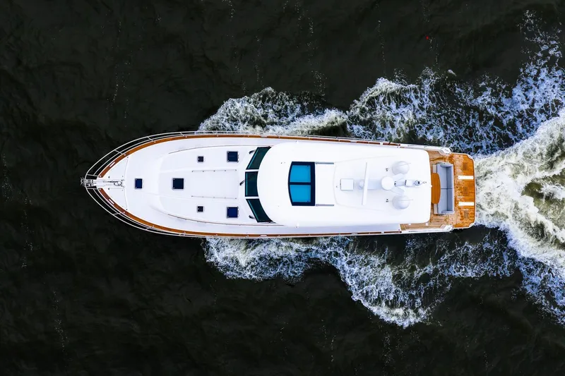  Yacht Photos Pics Aerial view of 2024 Sabre 58 Salon Express yacht cruising on water.