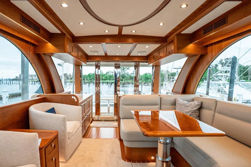  Yacht Photos Pics Luxurious interior of 2024 Sabre 58 Salon Express yacht with elegant wood finishes.