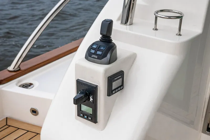 Yacht Photos Pics Control panel of 2024 Sabre 58 Salon Express yacht with joystick and digital display.
