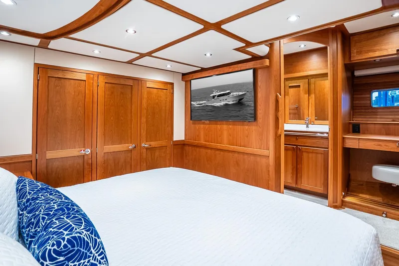  Yacht Photos Pics Luxurious 2024 Sabre 58 Salon Express cabin with elegant wood finishes and modern amenities.