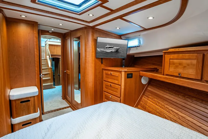  Yacht Photos Pics Luxurious interior of 2024 Sabre 58 Salon Express yacht with elegant wood finish.