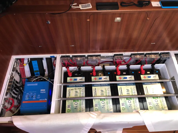 Ibis Yacht Photos Pics Battery compartment of a 2008 Outbound 46 yacht with lithium-ion batteries and electrical components.