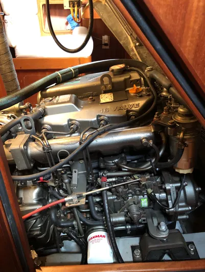 Ibis Yacht Photos Pics Engine compartment of a 2008 Outbound 46 sailboat, showcasing detailed mechanical components.