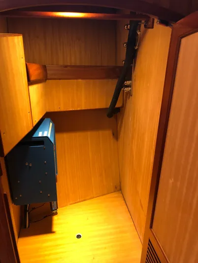 Ibis Yacht Photos Pics Wooden interior of 2008 Outbound 46 sailboat with electrical panel.