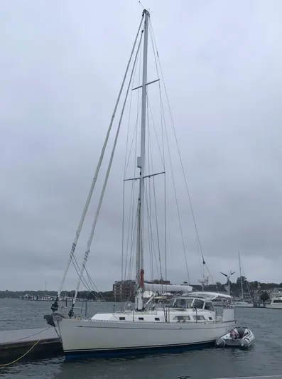 Ibis Yacht Photos Pics Sailboat docked on cloudy day, Outbound 46 model, 2008.