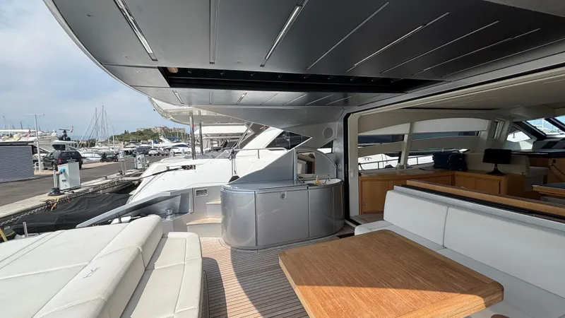 Dolce Vita Yacht Photos Pics Luxurious 2011 Pershing 74 yacht interior with spacious seating and modern design.
