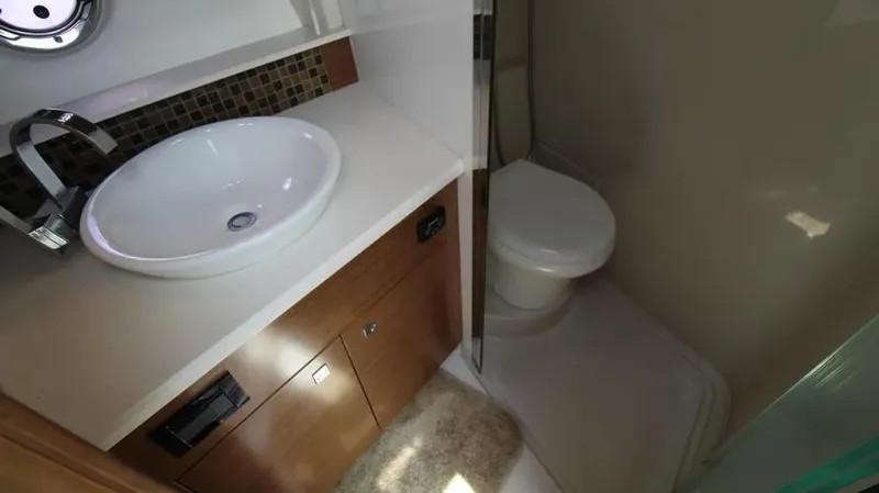 Stella Maris Yacht Photos Pics 2016 Cruisers Yachts 45 Cantius bathroom with modern sink and toilet.