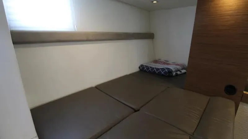 Stella Maris Yacht Photos Pics Interior cabin of 2016 Cruisers Yachts 45 Cantius with cozy bedding.