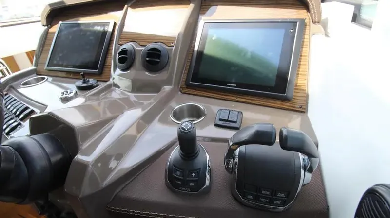 Stella Maris Yacht Photos Pics Helm of 2016 Cruisers Yachts 45 Cantius with dual screens and controls.