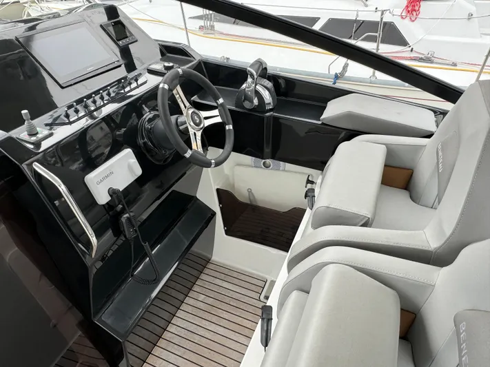La Bella Vita Yacht Photos Pics Interior of 2020 Beneteau Flyer 10 with modern helm station.