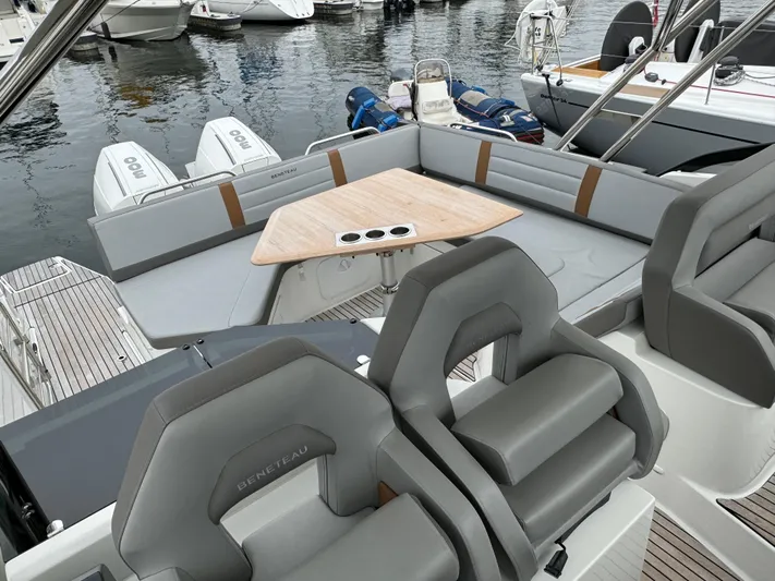 La Bella Vita Yacht Photos Pics Beneteau Flyer 10, 2020, luxury boat interior with seating and table.
